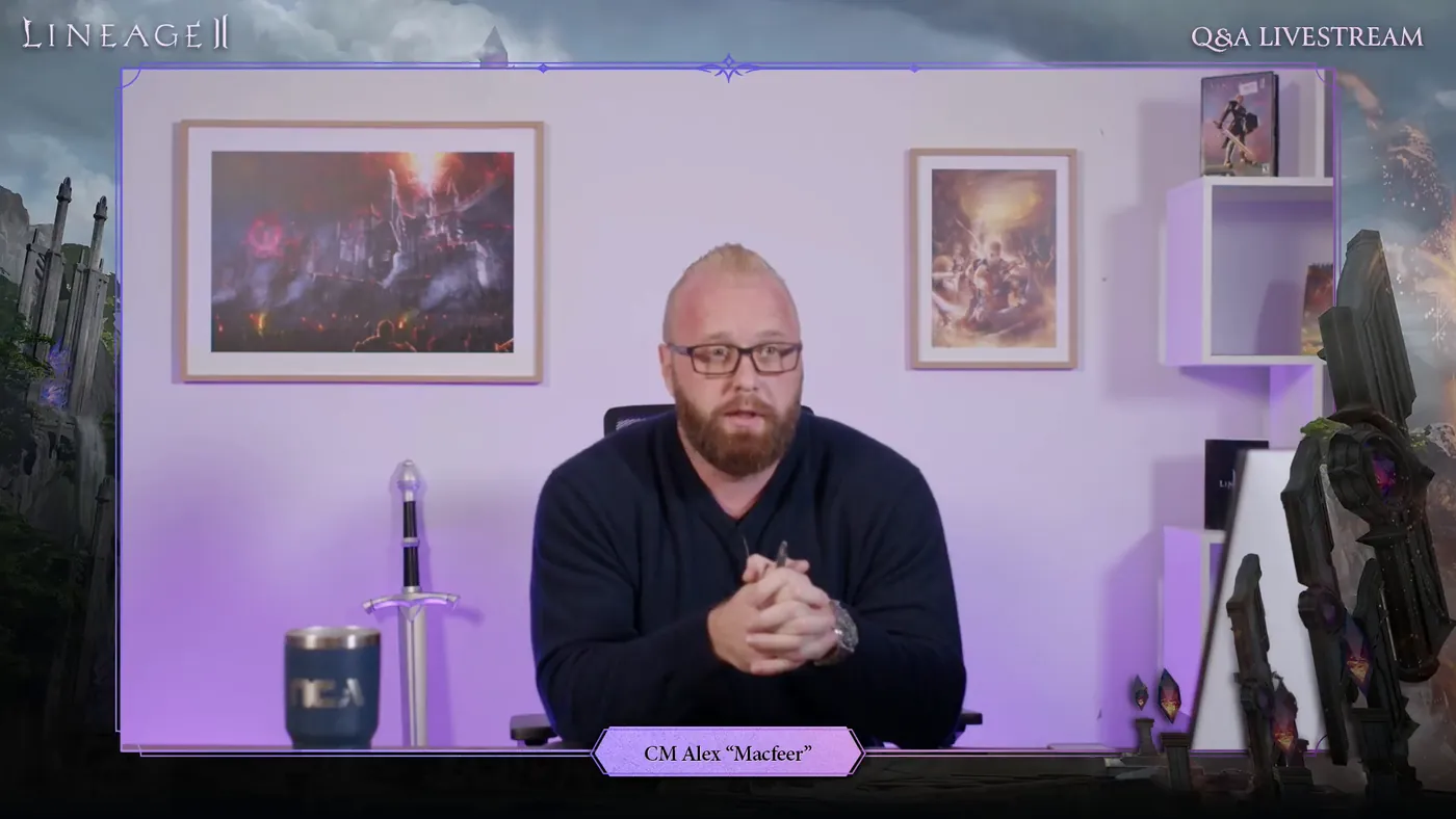 Комьюнити-менеджер Alex «Macfeer» за столом на стриме Q&A Livestream