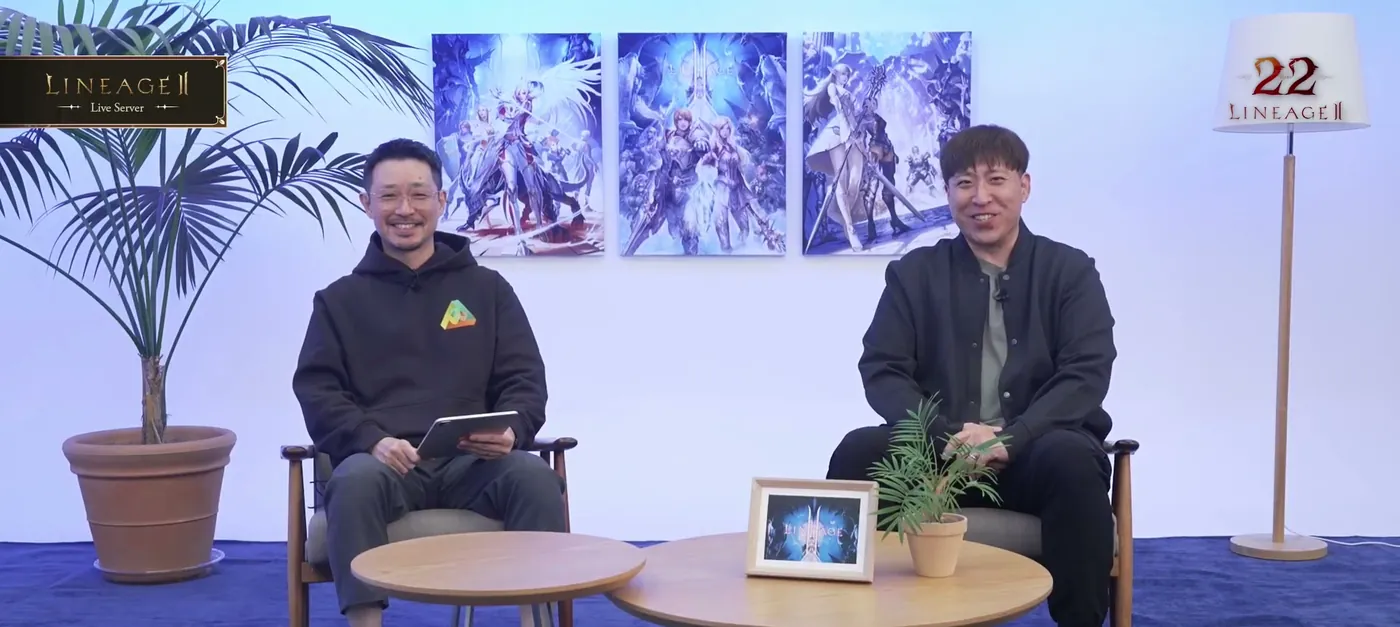 Ким Кын Ён с планшетом и Мун Сон Джун смеются в студии на фоне артов Lineage II